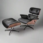 Full front view of the lounge chair charles eames and ottoman set in black aniline leather.