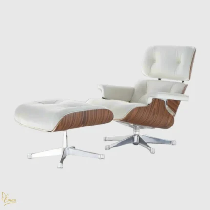 Charles and Ray Eames lounge chair and ottoman set in white leather with rosewood shells and chrome base.