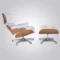 Full set of the eames chair lounge chair and ottoman in white leather and ash wood on a grey studio background.
