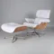 Eames chair lounge chair featuring premium white leather, ash wood shell, and chrome base.